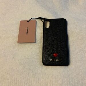 Miu Miu phone case with red heart accent